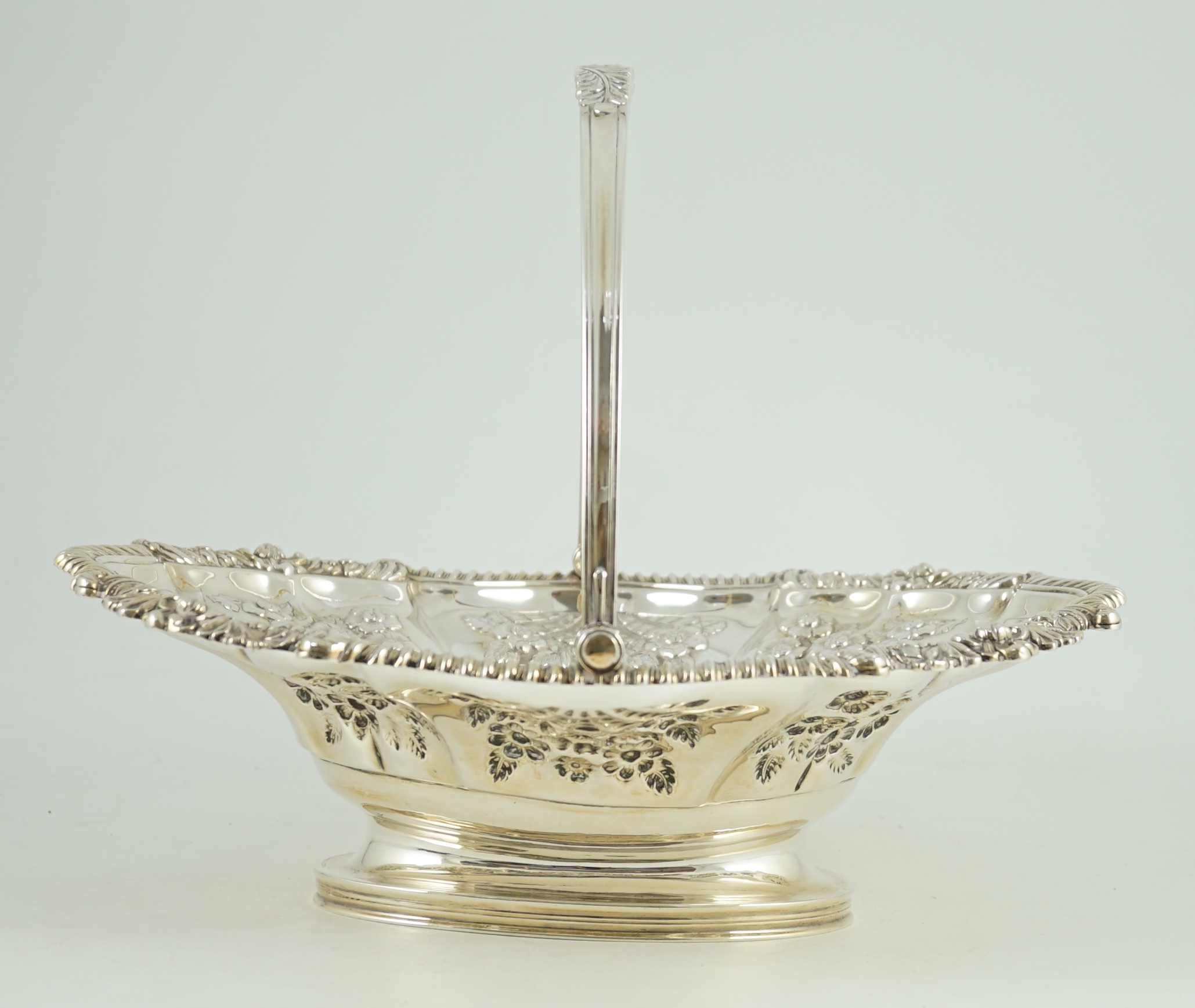 A late George III silver oval cake basket, by Kirby, Waterhouse & Co